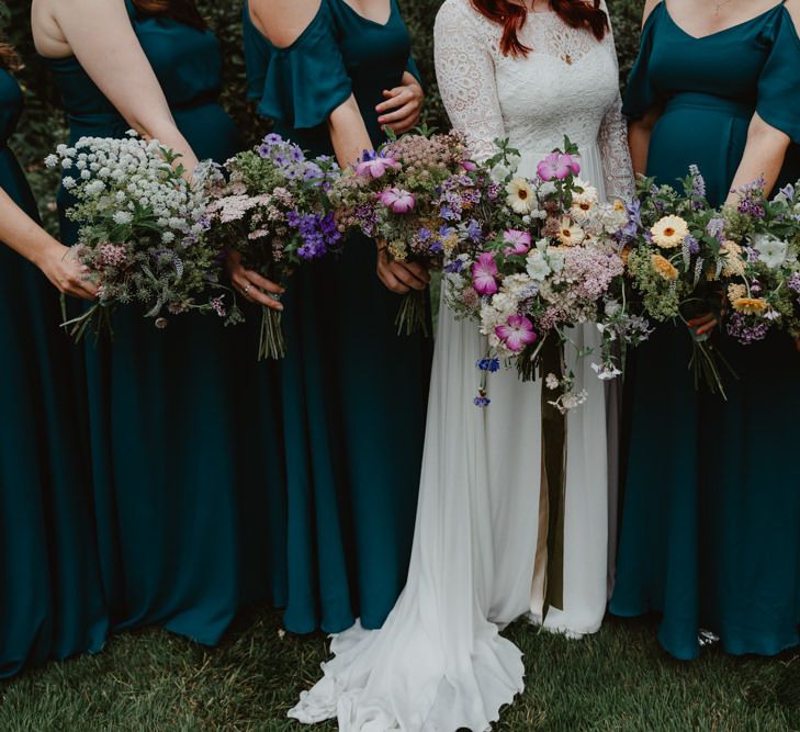 Rewritten Teal Bridesmaid Dresses With Wildflower Bouquets