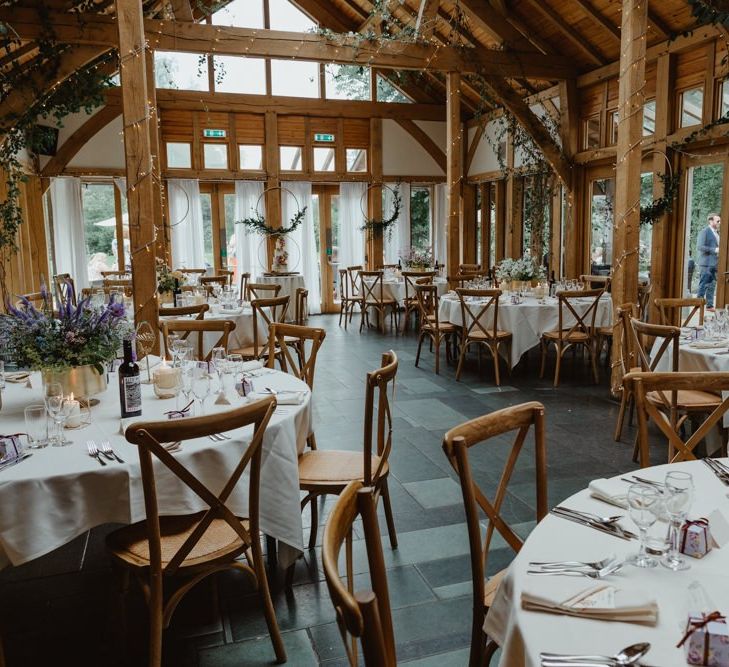 Rustic Wedding Venue Decorated With Wildflowers