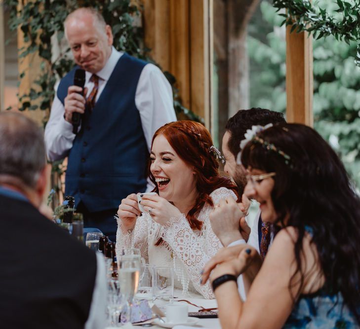 Bride Laughs During Speeches