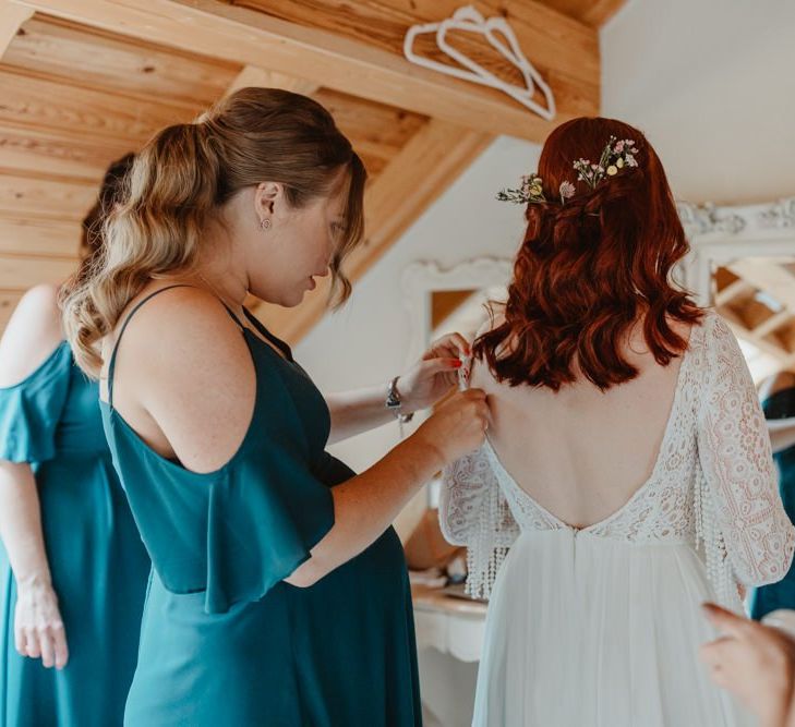 Bridal Preparations with Bridesmaids Helping Bride Get Ready