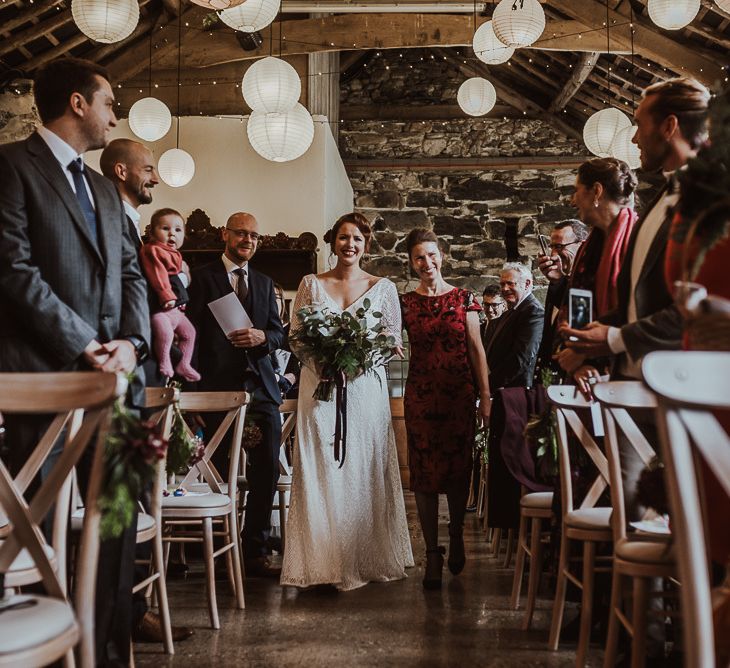 Bride enters ceremony at Snowdonia wedding