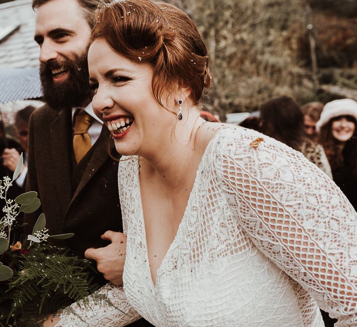 Bridal Updo with sleeved wedding dress