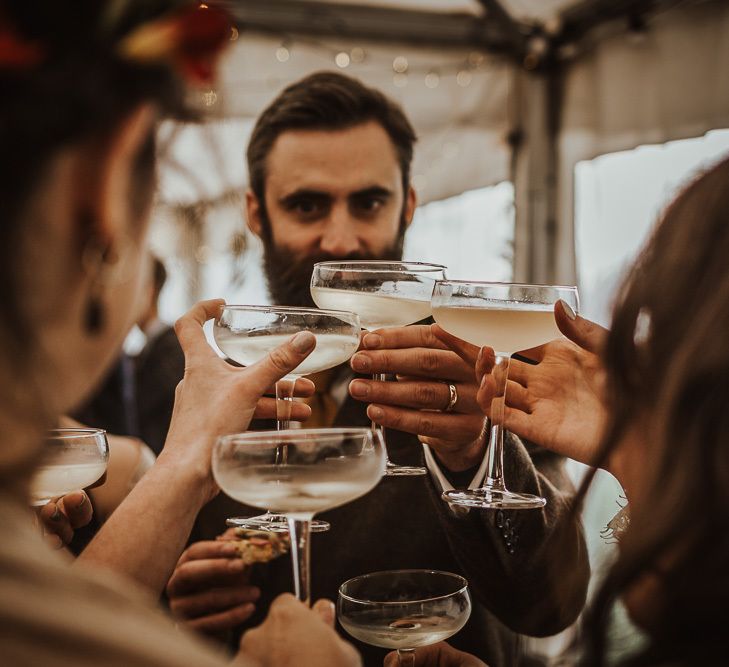 Guests toast the Snowdonia wedding