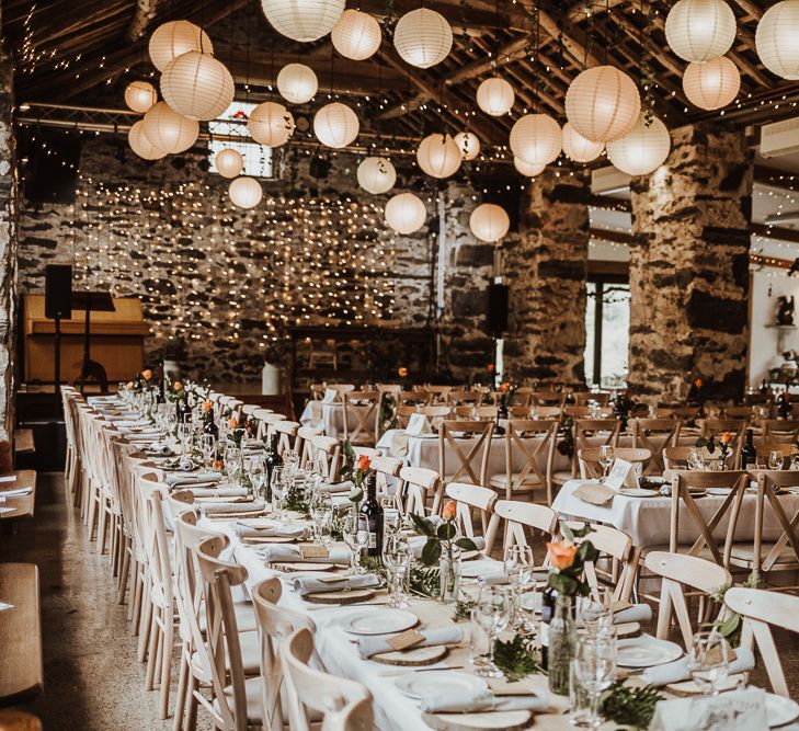 Cosy Autumnal wedding with fairy light backdrop