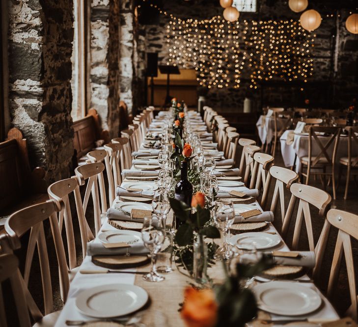 Wedding table decor with simple wedding flowers and foliage