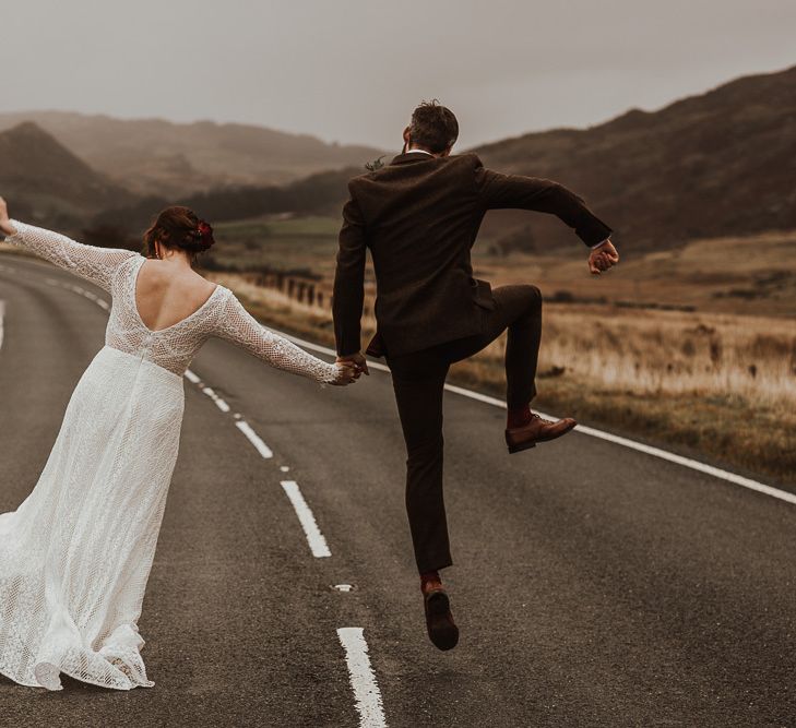 Bride and groom celebrate amongst the stunning scenery