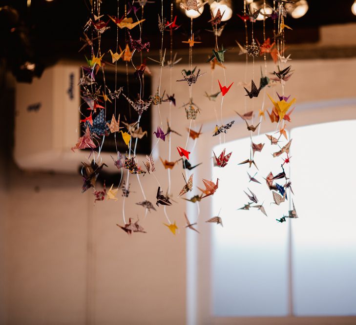 Hanging Paper Cranes | Trinity Buoy Wharf Wedding Venue | String Lights, Perspex Table Signs and Paper Cranes for Industrial Wedding | Frankee Victoria Photography