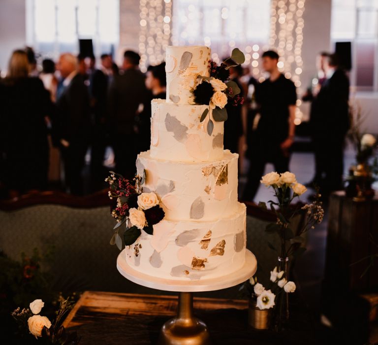 Four-Tier Wedding Cake with Painted Buttercream and Fragmented Edible Gold Leaf | String Lights, Perspex Table Signs and Paper Cranes for Industrial Wedding | Frankee Victoria Photography