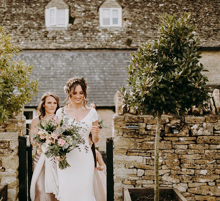 Beautiful Bride in Pronovias Dralan Wedding Dress with Romantic Pink, White and Green Bridal Bouquet