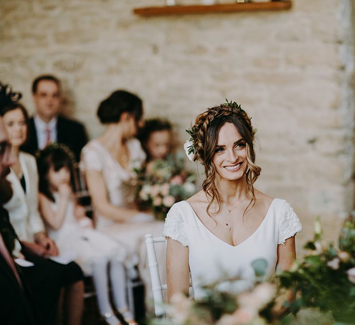 Beautiful Bride with Braided Updo in Pronovias Dralan Wedding Dress