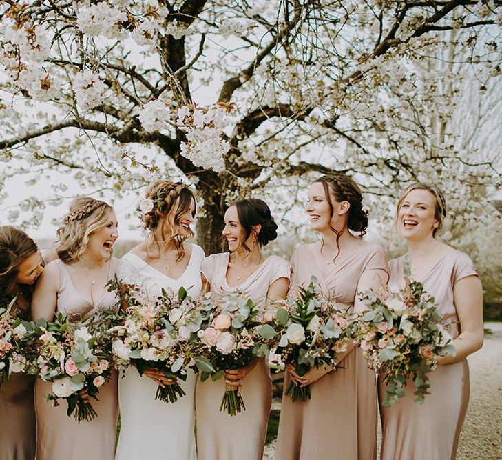 Bridal Party Portrait with Bridesmaids in Pink Ghost Dresses and Bride in Pronovias Dralan Wedding Dress