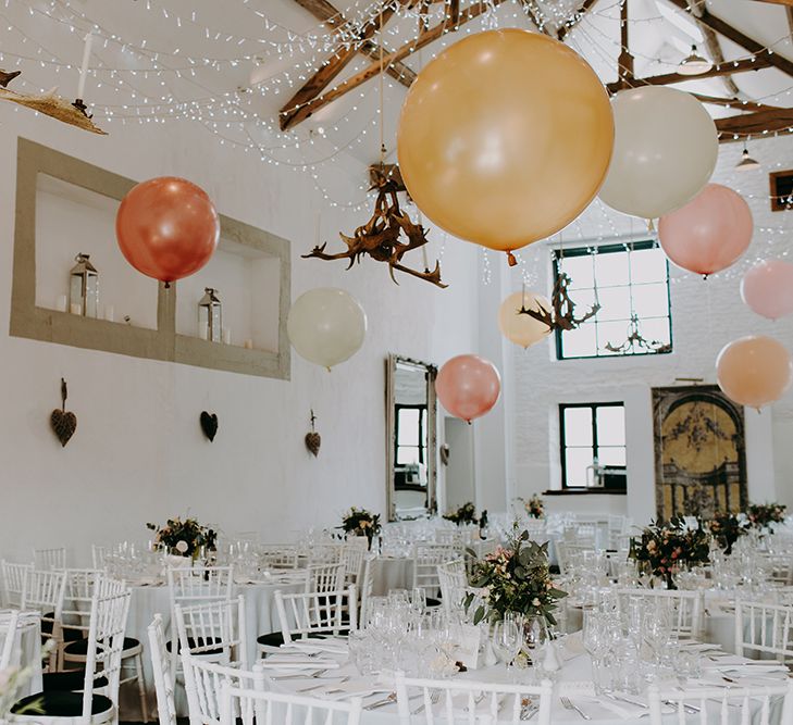 Merriscourt Barn Wedding Venue Decorated with Giant Balloons and Fairy Lights