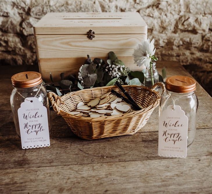 Wooden heart guest book at rustic styled wedding