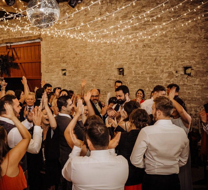 Cogges Manor Farm wedding reception with hanging fairy lights