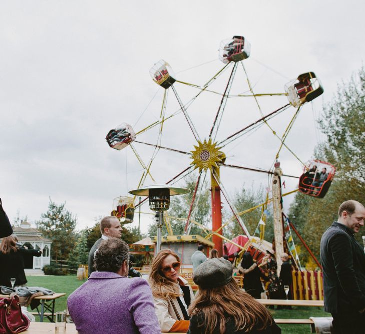 Fair Ground Ride. British tweed countryside wedding complete with Vintage Fun Fair | Sandra Mansour Dress | Hunter Wellies | Marleybrook House | Hunter Wellies | Images by David Jenkins