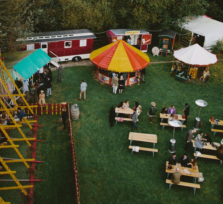 Fair Ground Ride. British tweed countryside wedding complete with Vintage Fun Fair | Sandra Mansour Dress | Hunter Wellies | Marleybrook House | Hunter Wellies | Images by David Jenkins