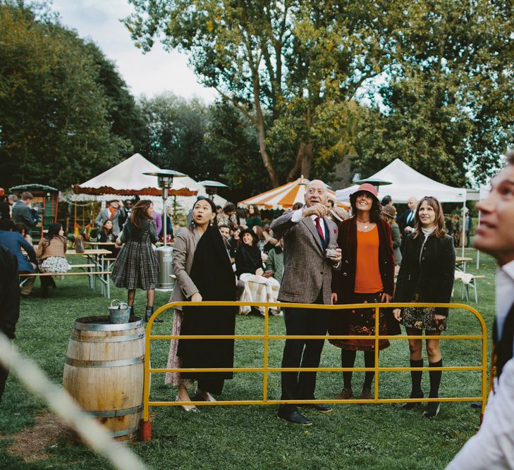 British tweed countryside wedding complete with Vintage Fun Fair | Sandra Mansour Dress | Hunter Wellies | Marleybrook House | Hunter Wellies | Images by David Jenkins