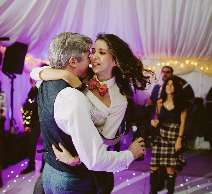 Brides second outfit. British tweed countryside wedding complete with Vintage Fun Fair | Sandra Mansour Dress | Hunter Wellies | Marleybrook House | Hunter Wellies | Images by David Jenkins