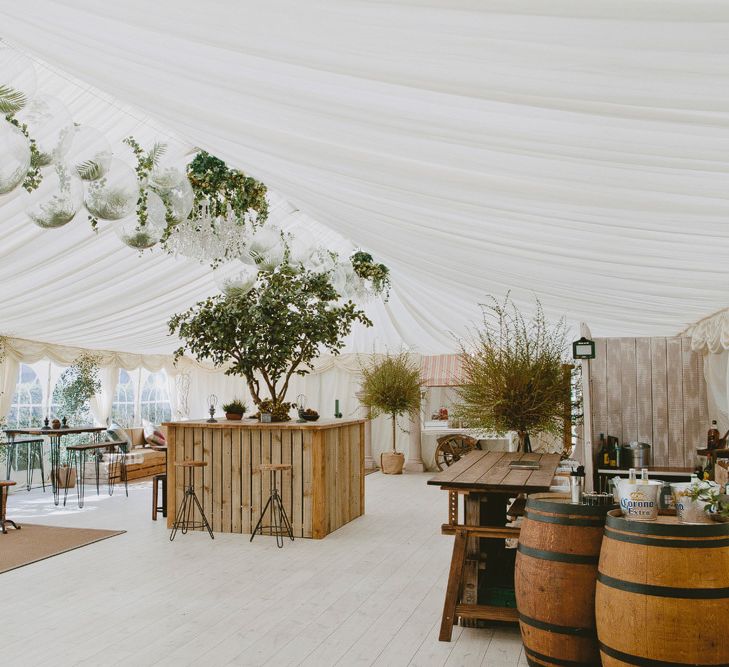 Decor by Venue. British tweed countryside wedding complete with Vintage Fun Fair | Sandra Mansour Dress | Hunter Wellies | Marleybrook House | Hunter Wellies | Images by David Jenkins