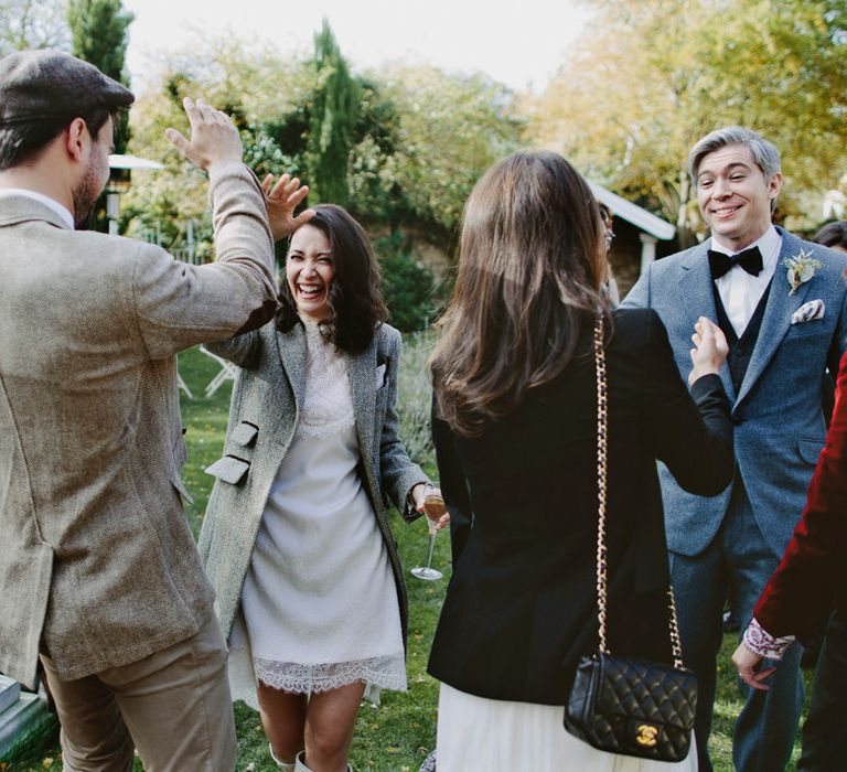 British tweed countryside wedding complete with Vintage Fun Fair | Sandra Mansour Dress | Hunter Wellies | Marleybrook House | Hunter Wellies | Images by David Jenkins