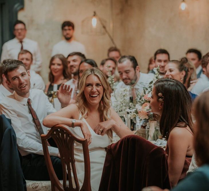 Bride And Guests Enjoy Wedding Speeches