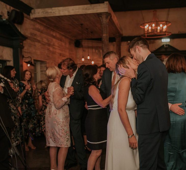 Bride and Groom Enjoy Dance