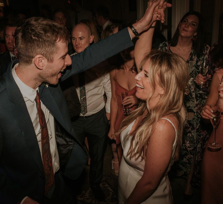 Bride and Groom Dance The Evening Away With Guests