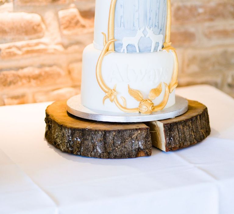 Harry Potter Wedding Cake on Tree Slice Cake Stand