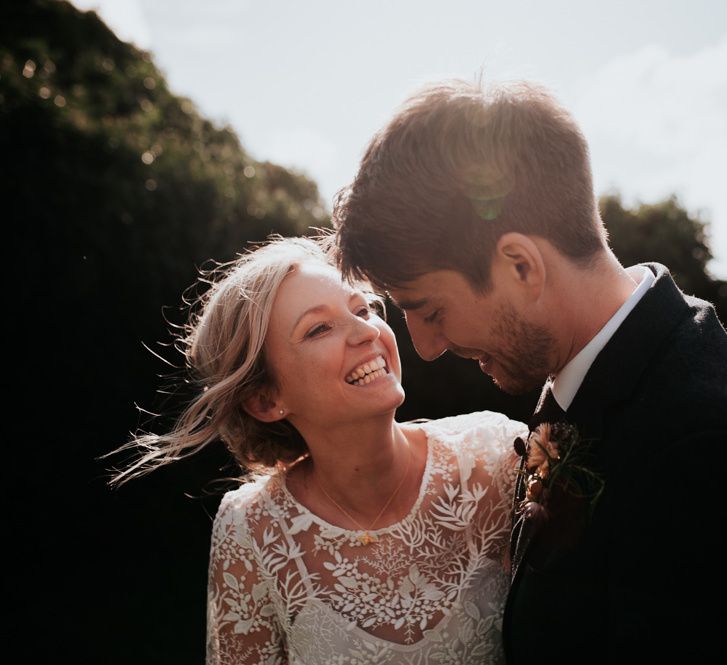 Bride and Groom Embrace