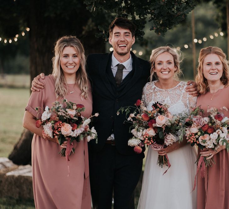 Bridesmaids in Blush Dresses with Pom Pom Dahlia and Cosmos Bouquets