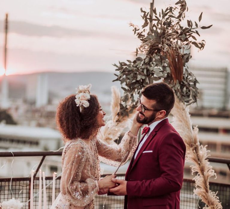 Tender wedding day moment at intimate boho wedding