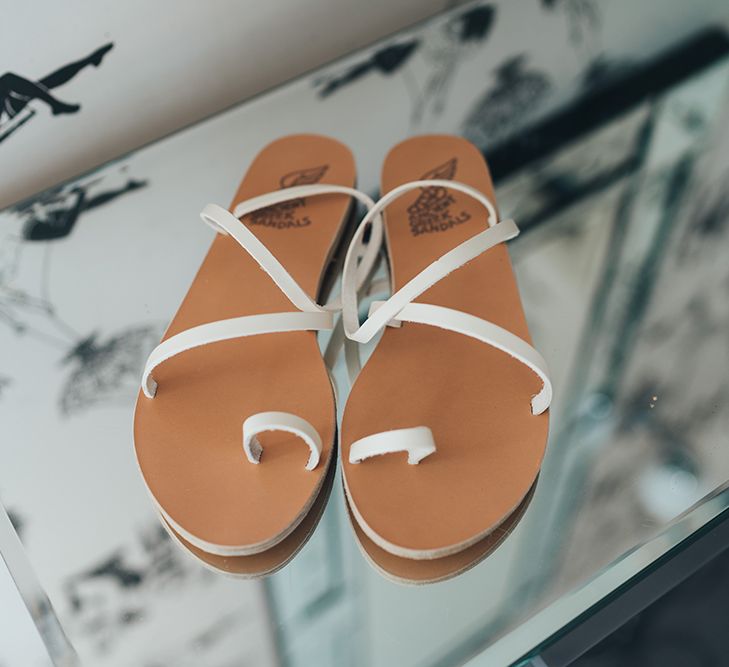 Strappy White Flat Sandals for Bride | Metallic Confetti Cannons and Paper Lanterns with Bride in Beaded Shoulder Eliza Jane Howell Dress | Miss Gen Photography