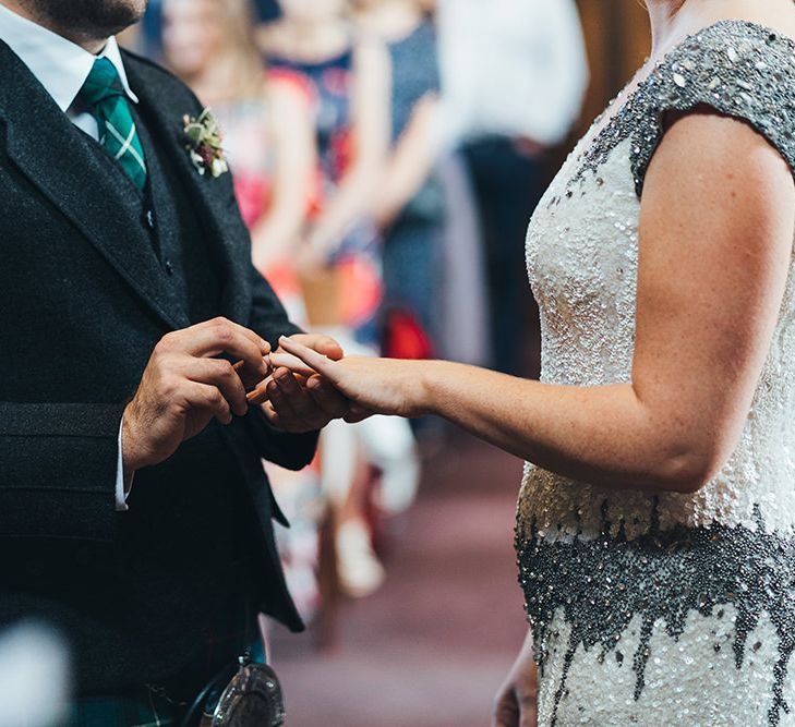 Bride in Embellished Shoulder Sequin Dress with Drop Waist by Eliza Jane Howell | Groom in Green and Blue Kilt | Wedding Ceremony at Stoke Newington Town Hall | Metallic Confetti Cannons and Paper Lanterns with Bride in Beaded Shoulder Eliza Jane Howell Dress | Miss Gen Photography