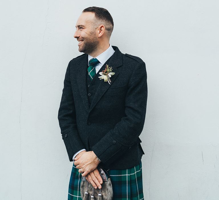 Groom in Green and Blue Tartan Kilt | Metallic Confetti Cannons and Paper Lanterns with Bride in Beaded Shoulder Eliza Jane Howell Dress | Miss Gen Photography