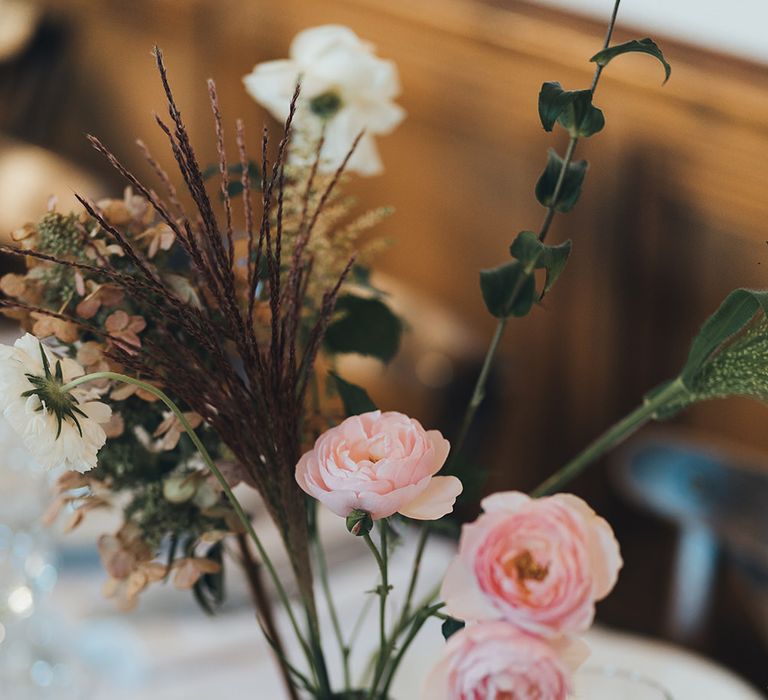 Bud Vase with Pink Flowers and Foliage | Wedding Reception at Clapton Country Club | Metallic Confetti Cannons and Paper Lanterns with Bride in Beaded Shoulder Eliza Jane Howell Dress | Miss Gen Photography