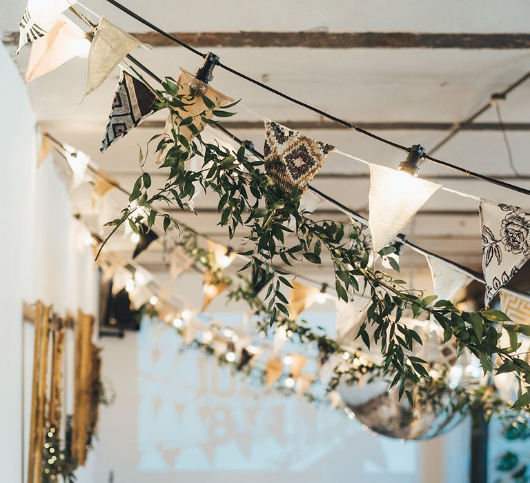 Hanging Foliage and Festoon Lights | Wedding Bunting | Glitter Ball | Letter Lights | Wedding Reception at Clapton Country Club | Metallic Confetti Cannons and Paper Lanterns with Bride in Beaded Shoulder Eliza Jane Howell Dress | Miss Gen Photography