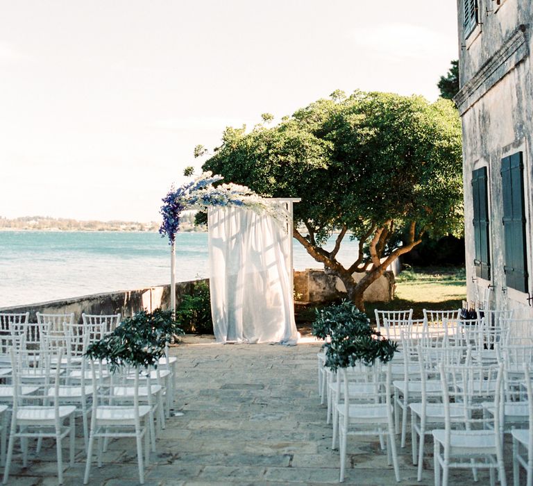 Outdoor Wedding Ceremony Aisle &amp; Altar | Pastel Blue &amp; Green, Romantic, Destination Wedding at Corfu Luxury Villas, Planned by Rosmarin Weddings &amp; Events | Mikhail Balygin Fine Art Wedding Photographer