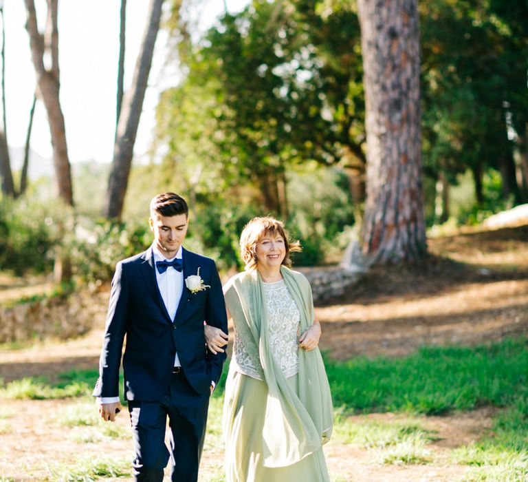 Outdoor Wedding Ceremony | Groom in Black Tie Suit | Pastel Blue &amp; Green, Romantic, Destination Wedding at Corfu Luxury Villas, Planned by Rosmarin Weddings &amp; Events | Mikhail Balygin Fine Art Wedding Photographer