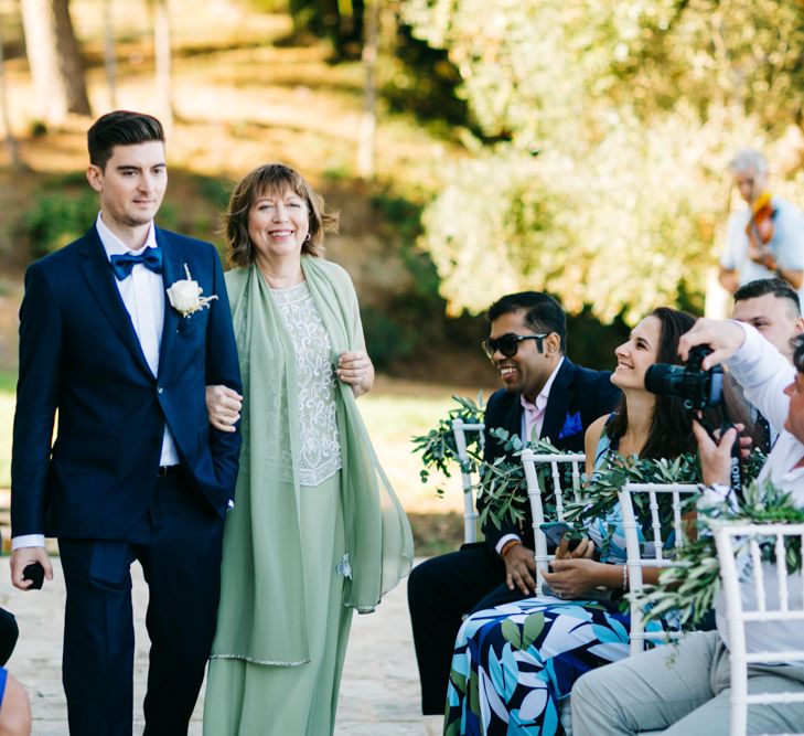 Outdoor Wedding Ceremony | Groom in Black Tie Suit | Pastel Blue &amp; Green, Romantic, Destination Wedding at Corfu Luxury Villas, Planned by Rosmarin Weddings &amp; Events | Mikhail Balygin Fine Art Wedding Photographer