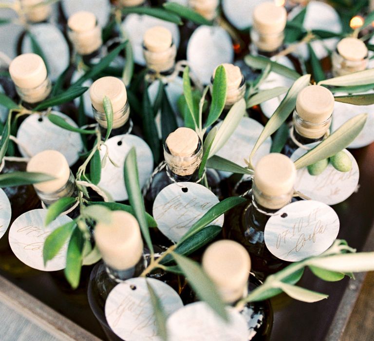 Miniture Olive Oil Wedding Favours | Pastel Blue &amp; Green, Romantic, Destination Wedding at Corfu Luxury Villas, Planned by Rosmarin Weddings &amp; Events | Mikhail Balygin Fine Art Wedding Photographer