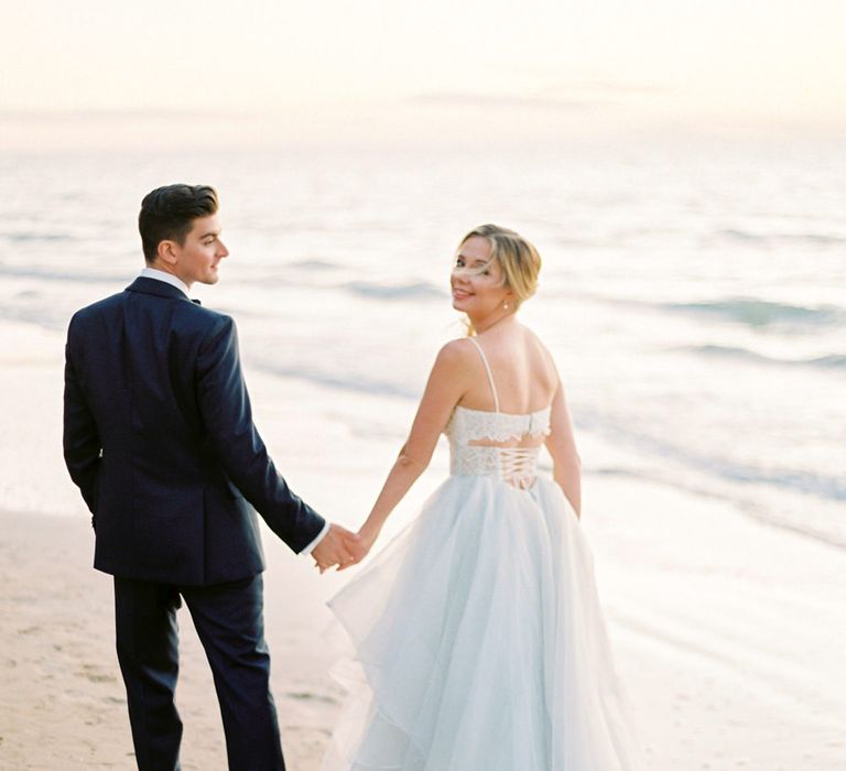 Bride in Coloured Hayley Paige Wedding Dress | Groom in Black Tie Suit | Pastel Blue &amp; Green, Romantic, Destination Wedding at Corfu Luxury Villas, Planned by Rosmarin Weddings &amp; Events | Mikhail Balygin Fine Art Wedding Photographer