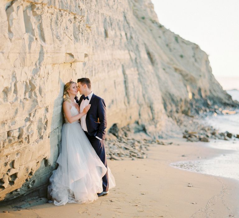 Bride in Coloured Hayley Paige Wedding Dress | Groom in Black Tie Suit | Pastel Blue &amp; Green, Romantic, Destination Wedding at Corfu Luxury Villas, Planned by Rosmarin Weddings &amp; Events | Mikhail Balygin Fine Art Wedding Photographer