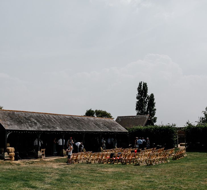 Elmley Nature Reserve Wedding Outdoor Ceremony at KingsHill Barn on Elmley Nature Reserve