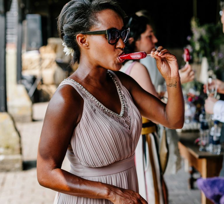 Bridesmaid in Blush Pink Dress Eating an Ice Lolly