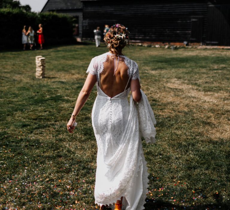 Bride in Lace Made with Love Wedding Dress  with Low Back and Separate Cape