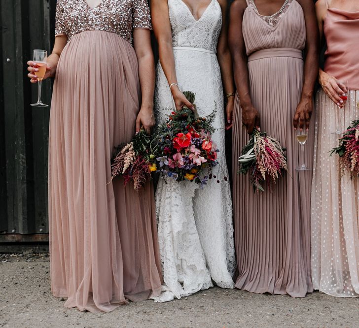 Bridal Party Holding Handpicked Wild Bouquets