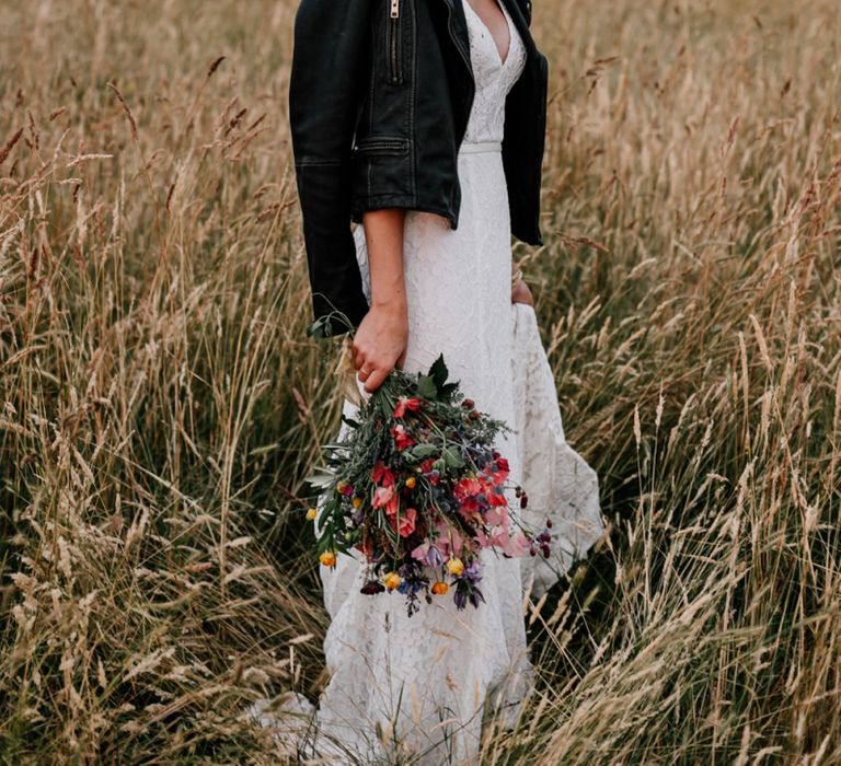 Cool Bride in Made with Love Lace Wedding Dress and Black Leather Jacket