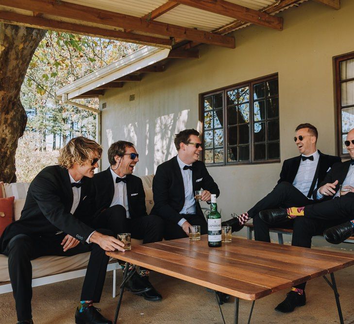 Groomsmen Wear Tuxedos For Black Tie Wedding