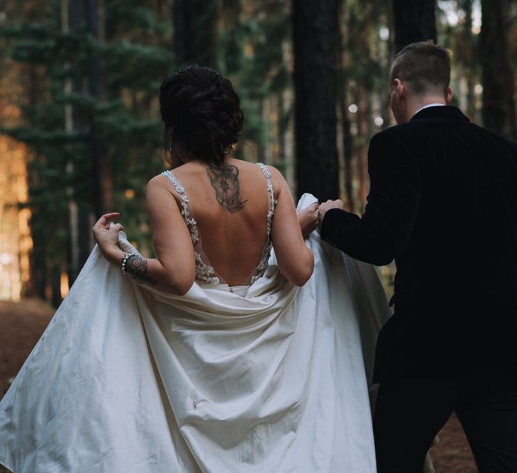 Low Back A-Line Wedding Dress At Wedding With Polaroid Guest Book