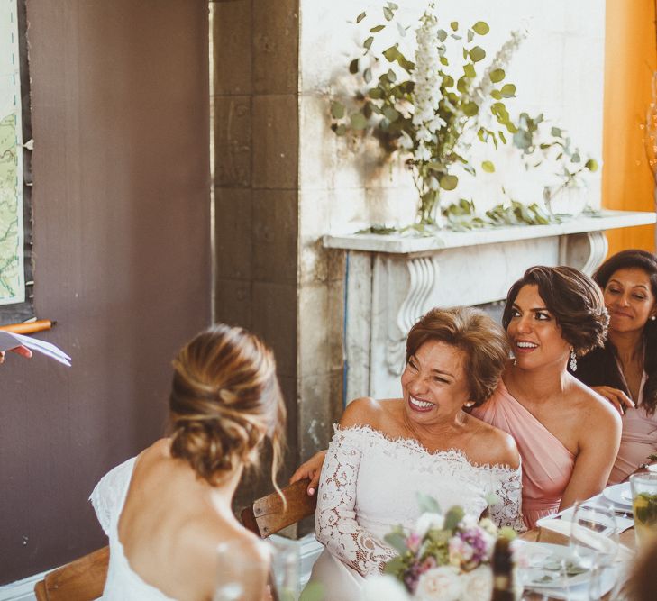 Mother of The Bride in Lace Bardot Dress Laughing During The Speeches.